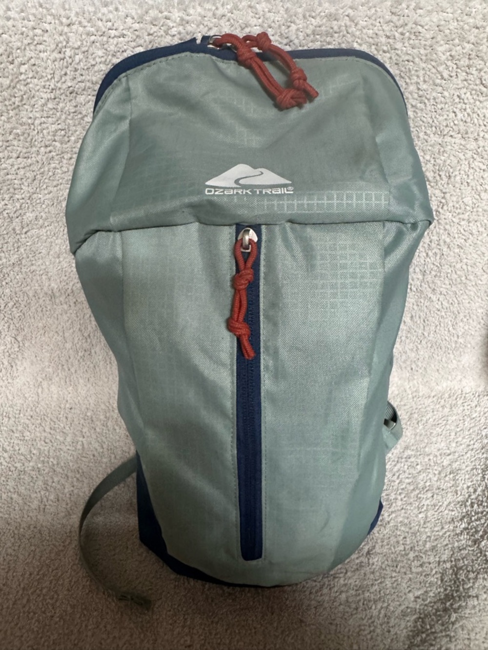 Ozark Trail Light Blue Backpack with Navy and Rust Accents